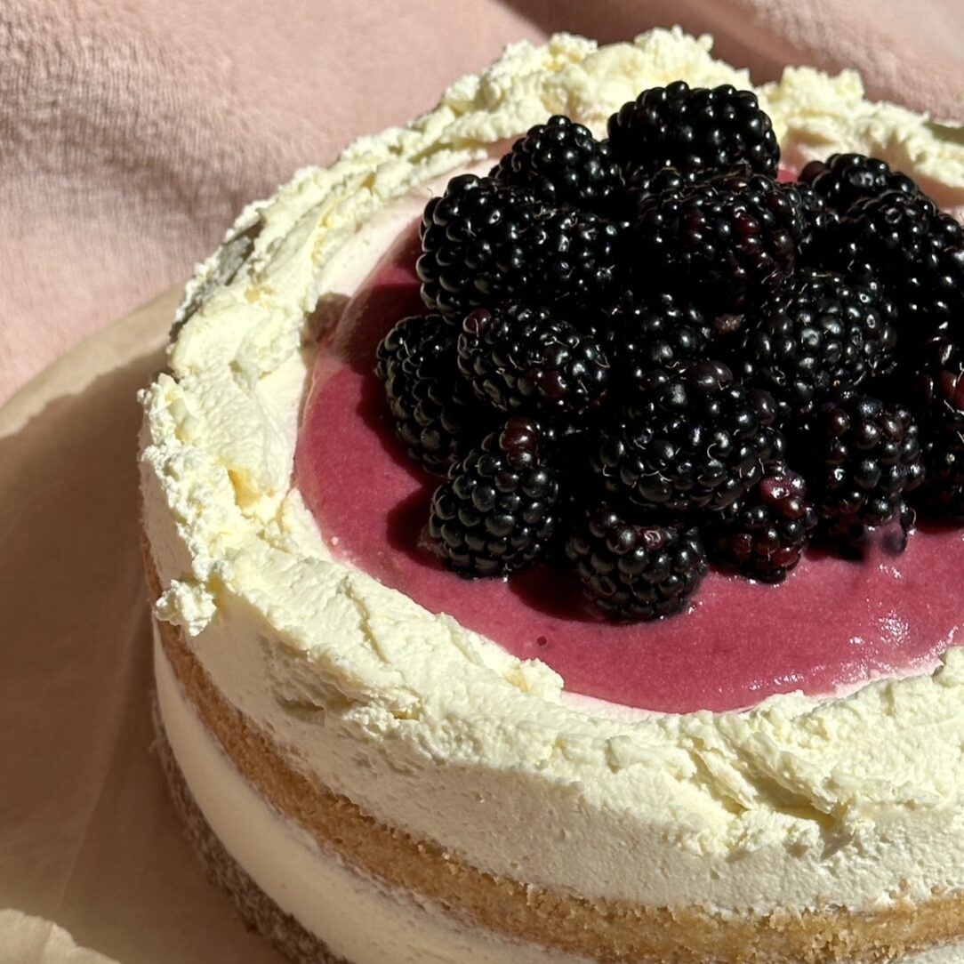 Blackberry and lemon cake with blackberry curd filling and decoration