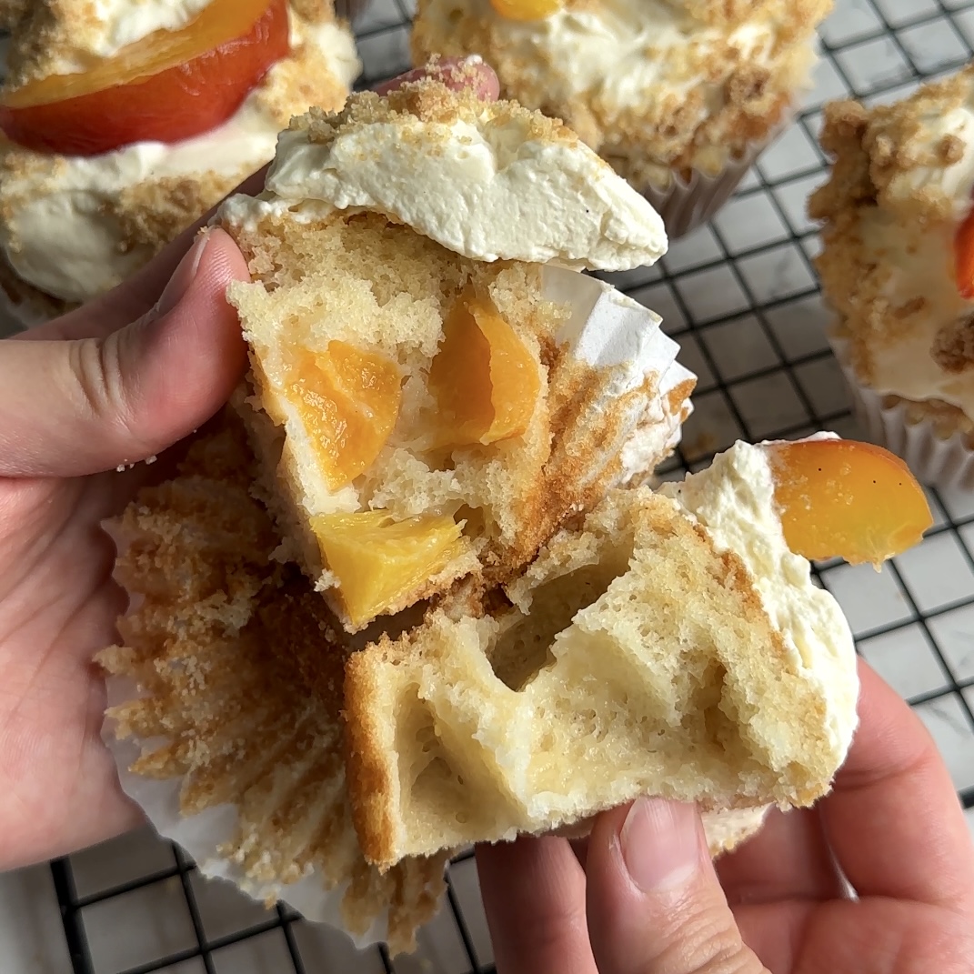 Peaches and Cream Streusel Muffins - inside view filled with peach chunks