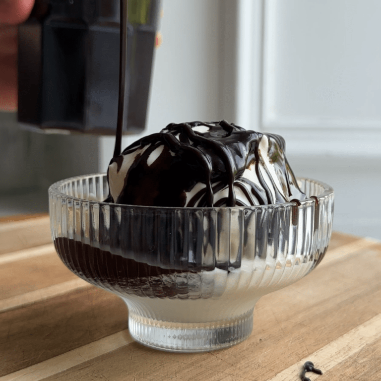 Hot fudge sauce on ice cream